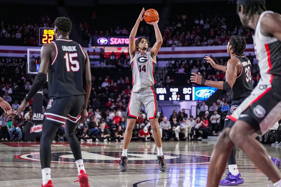 Jan 28, 2025; Athens, Georgia, USA; Georgia Bulldogs forward Asa Newell (14) shoots against the South Carolina Gamecocks at Stegeman Coliseum. Mandatory Credit: Dale Zanine-Imagn Images