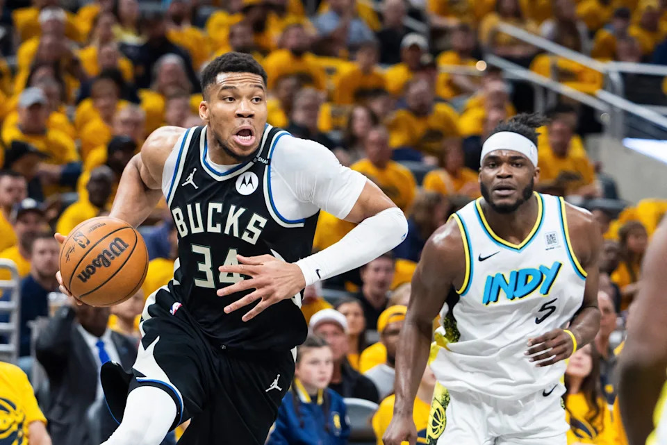 Milwaukee Bucks forward Giannis Antetokounmpo (34) dribbles the ball while Indiana Pacers forward Jarace Walker (5) defends during an NBA playoff game on April 19, 2025.