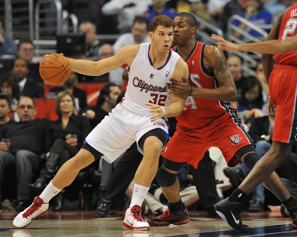 Nov 15, 2010; Los Angeles, CA, USA; Los Angeles Clippers forward Blake Griffin (32) posts up on New Jersey Nets forward Derrick Favors (14) at the Staples Center. The New Jersey Nets won 110-96. Mandatory Credit: Kelvin Kuo-USA TODAY Sports