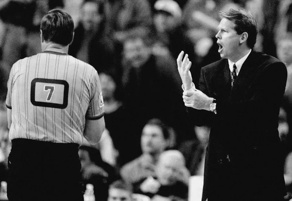 SEATTLE, UNITED STATES: Phoenix Sun Coach Danny Ainge(R) yells at referee during Western Conference playoff game against the Seattle SuperSonics 27 April in Seattle. Ainge eventually received two technical fouls and was ejected.