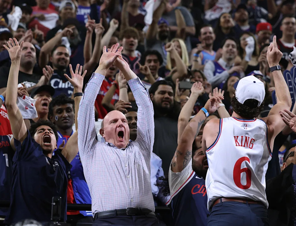 Los Angeles Clippers owner Steve Ballmer cheers with fans as part of "The Wall," a section of the new Intuit Dome comprised solely of loyal Clippers supporters.