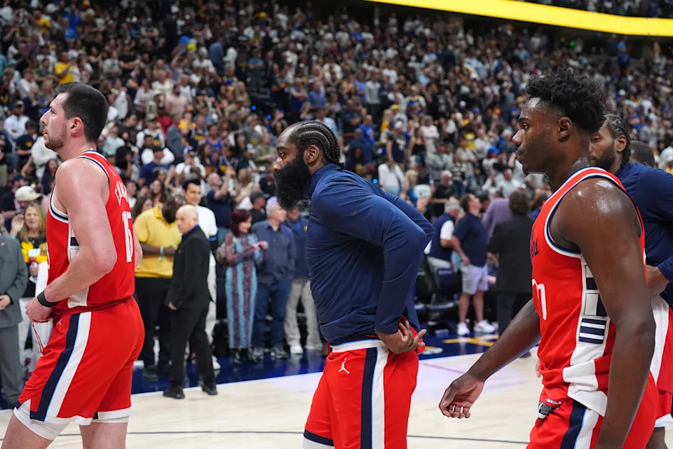 From left to right, Los Angeles Clippers forward Drew Eubanks and guards James Harden and Kobe Brown head off the court after Game 7 of an NBA basketball first-round playoff series against the Denver Nuggets, Saturday, May 3, 2025, in Denver. (AP Photo/David Zalubowski)