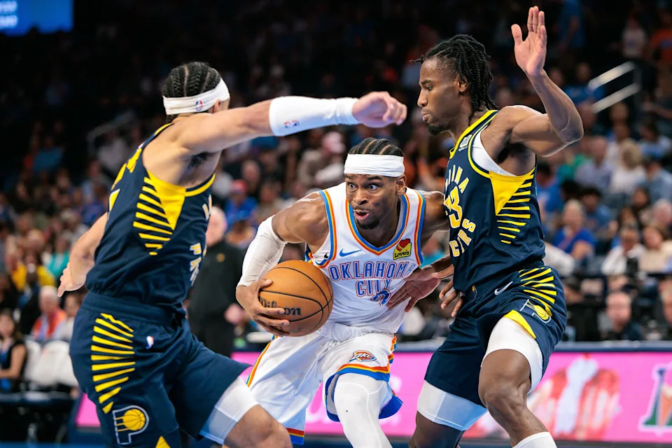 OKLAHOMA CITY, OKLAHOMA - MARCH 29: Shai Gilgeous-Alexander #2 of the Oklahoma City Thunder drives to the basket around Myles Turner #33 of the Indiana Pacers during the third quarter Paycom Center on March 29, 2025 in Oklahoma City, Oklahoma.