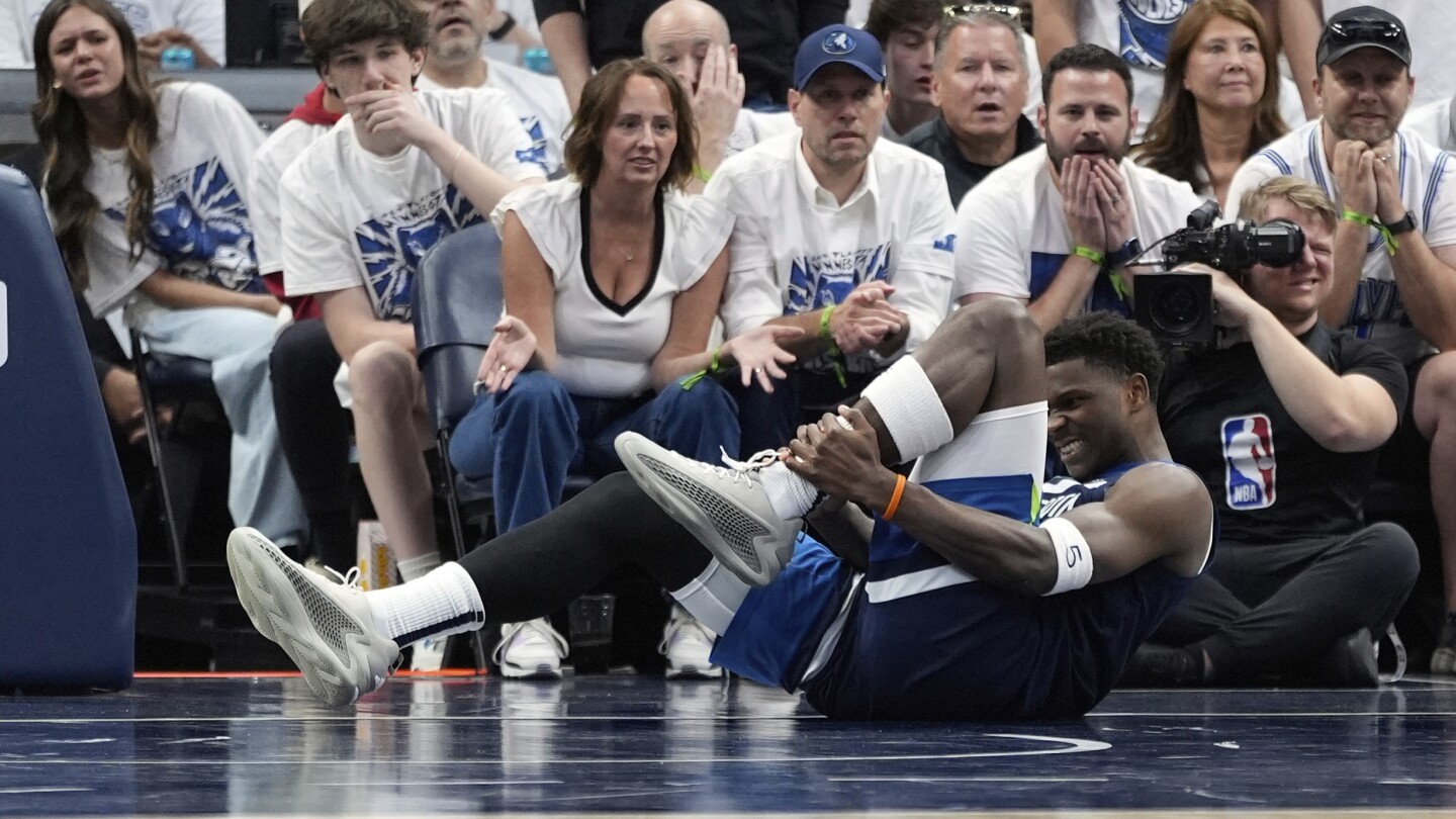 Timberwolves' Edwards leaves Game 2 with sprained left ankle before returning for 2nd half