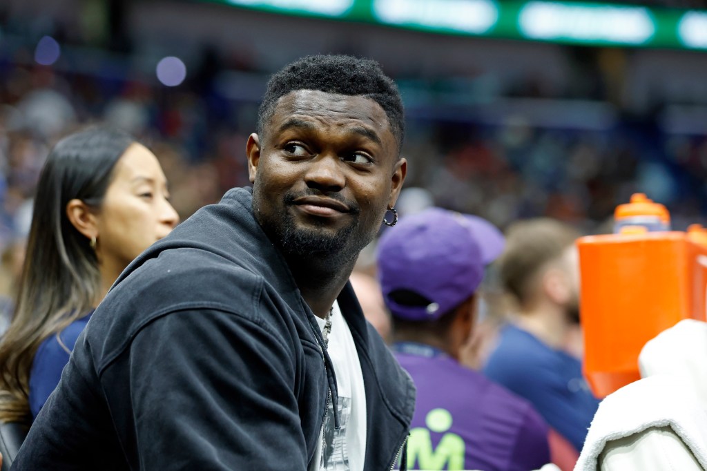 Zion Williamson #1 of the New Orleans Pelicans sits on the bench during the first half of a game against the Oklahoma City Thunder