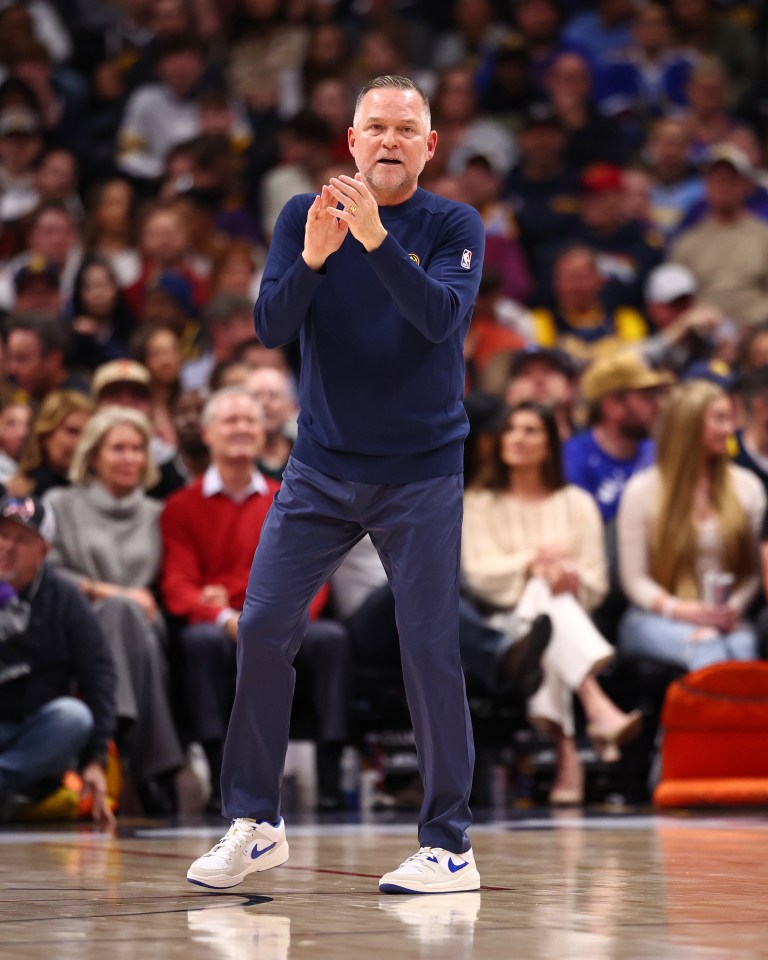 Michael Malone, Denver Nuggets head coach, on the court.