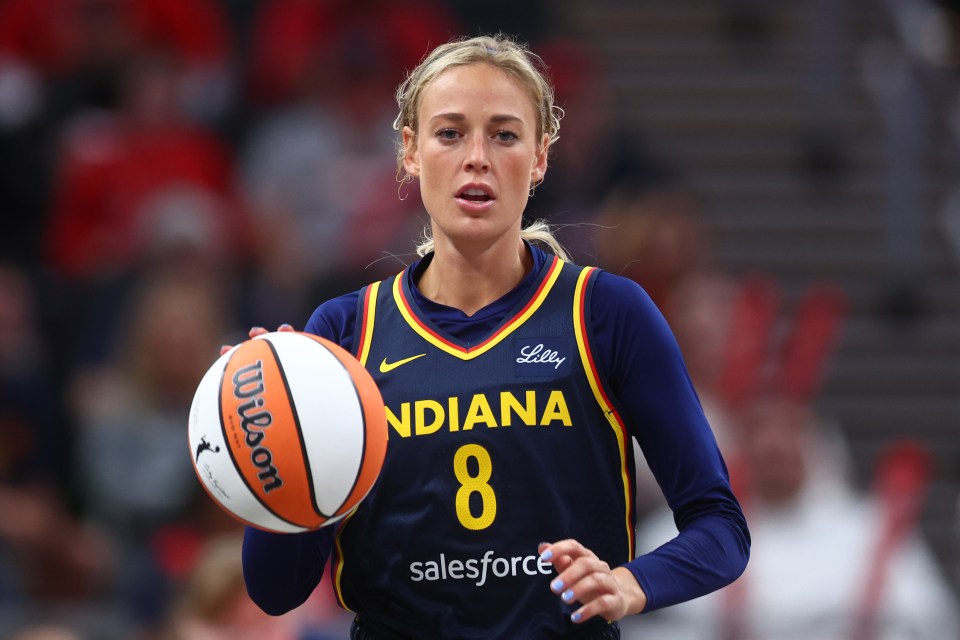 Sophie Cunningham #8 of the Indiana Fever dribbling a basketball.