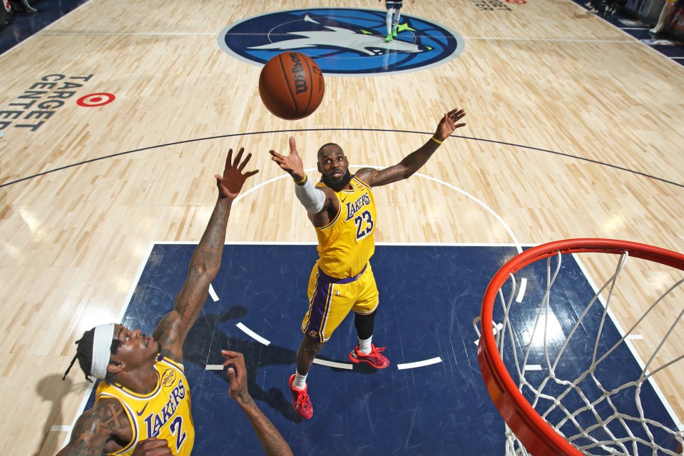 LeBron James #23 of the Los Angeles Lakers shoots a basketball.