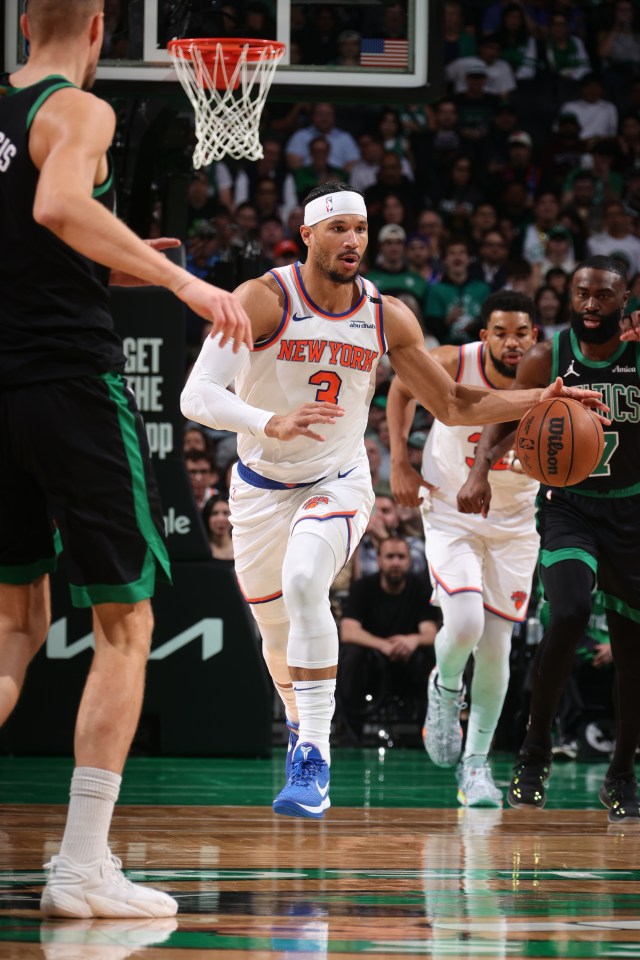 Josh Hart #3 of the New York Knicks dribbling the ball during an NBA Playoffs game.