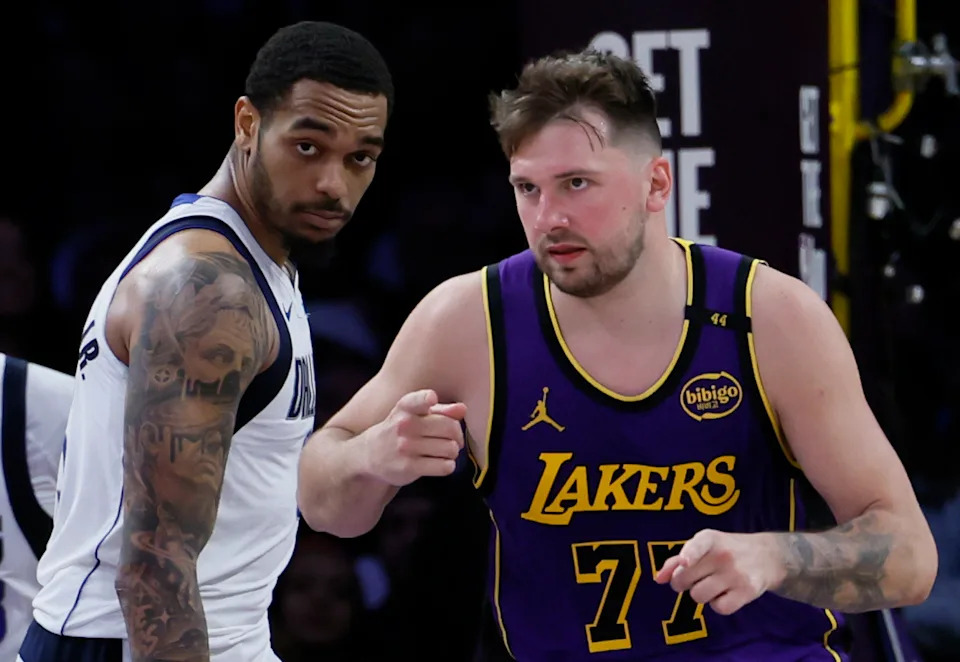 Will Luka Dončić actually play in October's Lakers-Mavericks exhibition in Las Vegas? (Allen J. Schaben / Los Angeles Times via Getty Images)