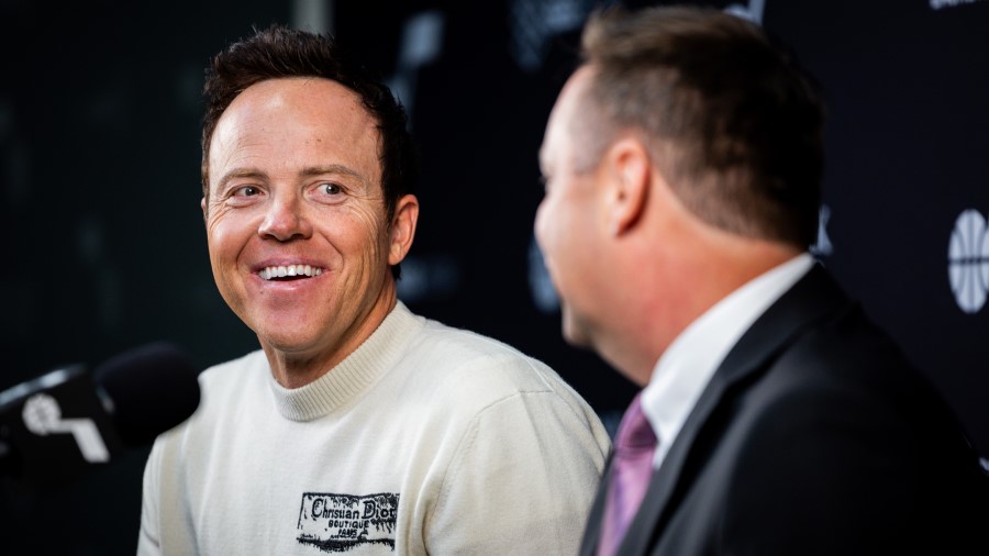 Austin Ainge, right, president of basketball operations for the Utah Jazz and Utah Jazz Governor Ry...