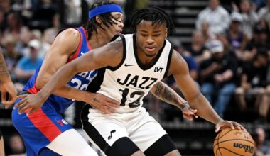 Utah Jazz guard Isaiah Collier (13) spins away from Philadelphia 76er R.J. Hampton (26) as the Utah...