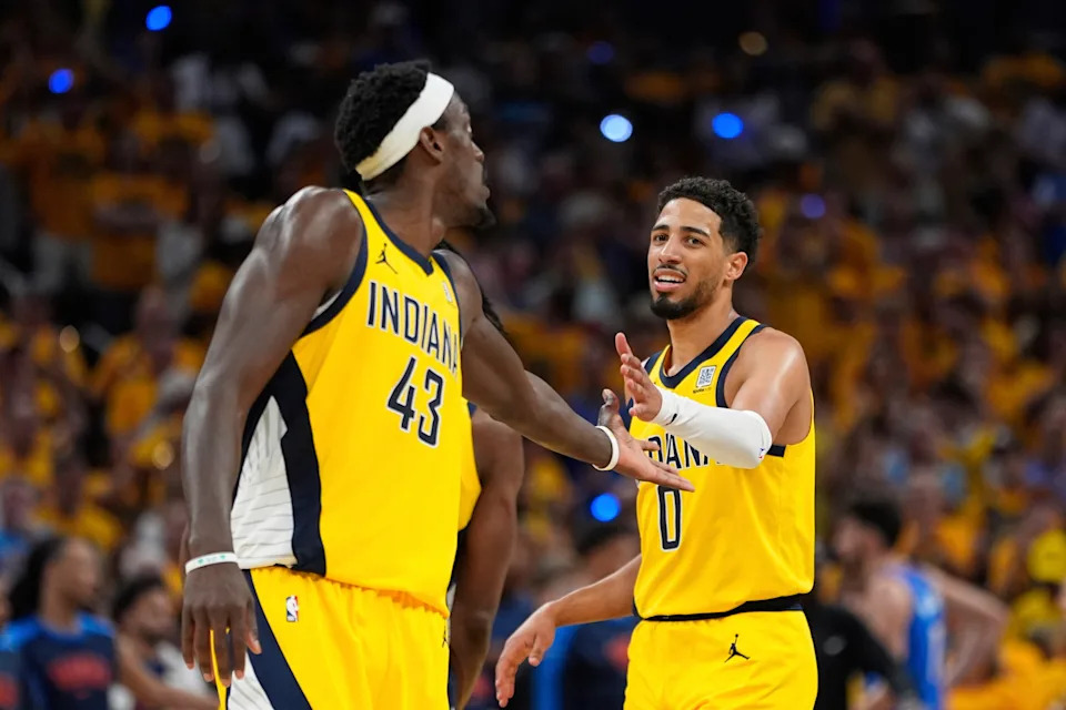 Indiana Pacers guard Tyrese Haliburton (0) celebrates with forward Pascal Siakam (43) during the second half of Game 6 of the NBA Finals basketball series against the Oklahoma City Thunder, Thursday, June 19, 2025, in Indianapolis. (AP Photo/Abbie Parr)