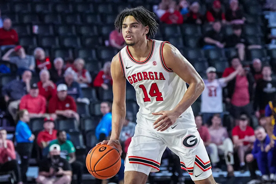 Feb 5, 2025; Athens, Georgia, USA; Georgia Bulldogs forward Asa Newell (14) controls the ball against the LSU Tigers during the second half at Stegeman Coliseum. Mandatory Credit: Dale Zanine-Imagn Images