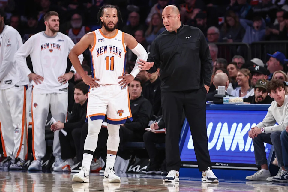 Dec 1, 2024; New York, New York, USA; New York Knicks guard Jalen Brunson (11) talks with Assistant Coach Rick Brunson in the third quarter against the New Orleans Pelicans at Madison Square Garden. © Wendell Cruz-Imagn Images