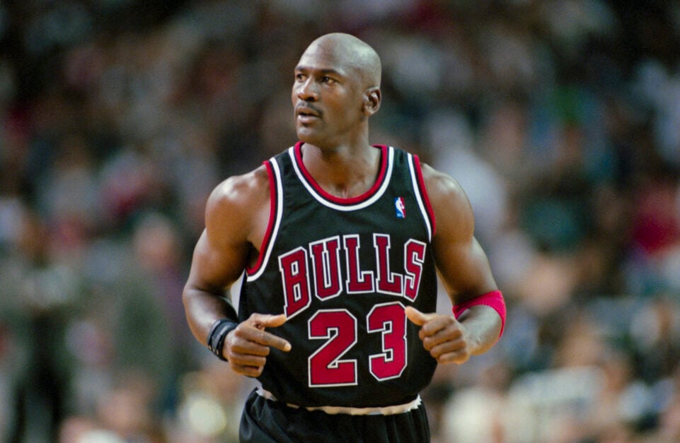 #23 of the Chicago Bulls, Michael Jordan jogging on the court.
