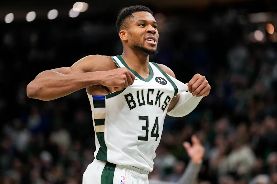 Nov 13, 2024; Milwaukee, Wisconsin, USA; Milwaukee Bucks forward Giannis Antetokounmpo (34) celebrates after scoring during overtime against the Detroit Pistons at Fiserv Forum.© Jeff Hanisch-Imagn Images