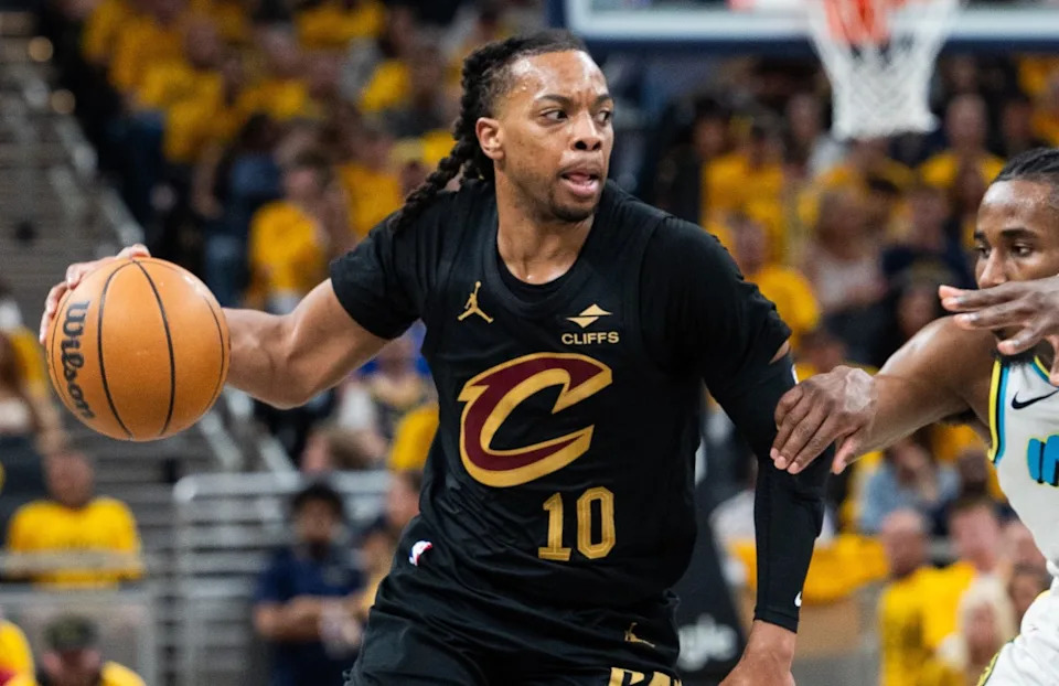 May 9, 2025; Indianapolis, Indiana, USA; Cleveland Cavaliers guard Darius Garland (10) dribbles the ball while Indiana Pacers forward Aaron Nesmith (23) defends during game three of the second round for the 2025 NBA Playoffs at Gainbridge Fieldhouse.Mandatory Credit: Trevor Ruszkowski-Imagn Images