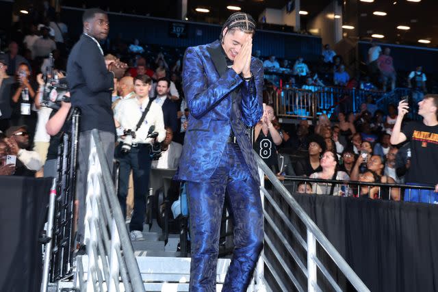  Jeff Haynes/NBAE/Getty Yanic Konan Niederhauser looks on after being drafted