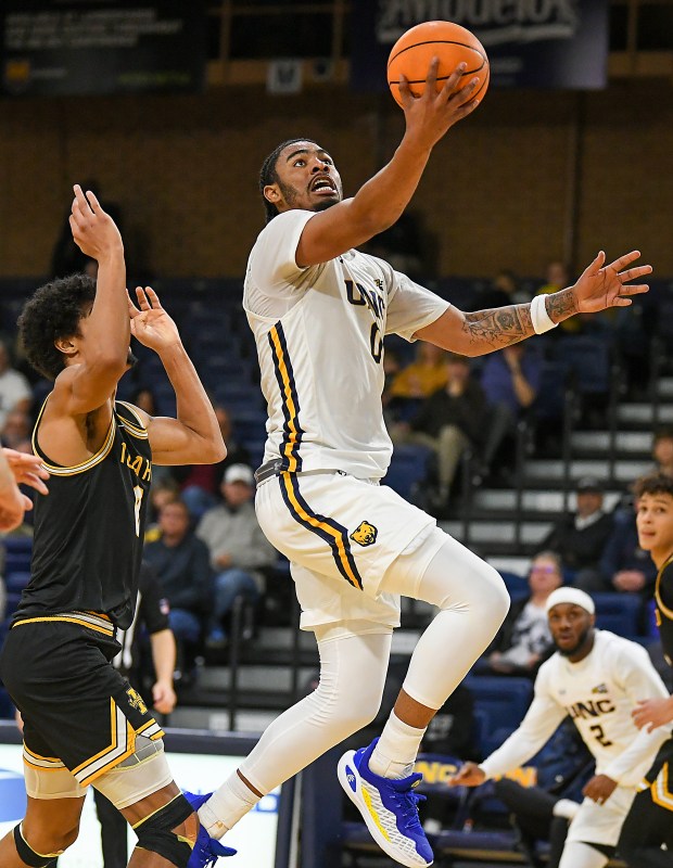 University of Northern Colorado junior Saint Thomas glides to the basket to score while playing Idaho at Bank of Colorado Arena in Greeley on Thursday Feb. 22, 2024.(Jim Rydbom/Staff Photographer)