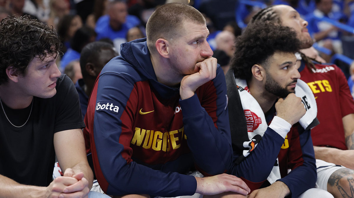 Denver Nuggets center Nikola Jokic (15) watches the game from the bench in the fourth quarter against the Oklahoma City Thunder in game seven of the second round for the 2025 NBA Playoffs at Paycom Center.