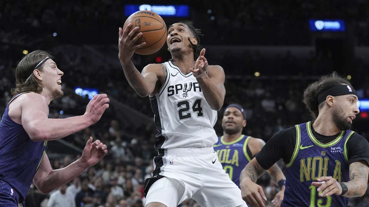 Vassell scores 22 points and Spurs hold off Pelicans, who were without Williamson