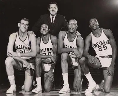 University of Cincinnati coach Ed Jucker with some of the key players from his 1962 NCAA champion Bearcats: (L-R) Ron Bonham, Tony Yates, George Wilson and Tom Thacker.

636768344785313271-uc6162.jpg