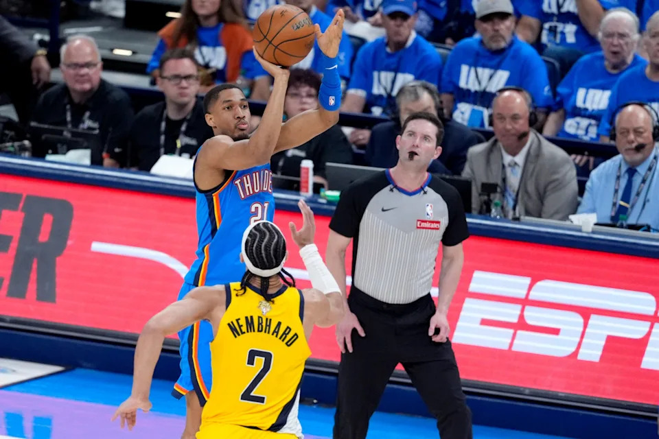 Oklahoma City Thunder guard Aaron Wiggins (21) shoots a 3-pointer pver Indiana Pacers guard Andrew Nembhard (2) during Game 2 of the NBA Finals between the Oklahoma City Thunder and the Indiana Pacers at Paycom Center in Oklahoma City, Sunday, June 8, 2025. Oklahoma City won 123-107.