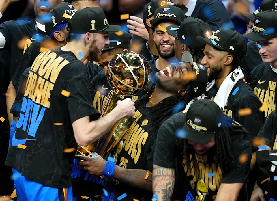 Chet Holmgren (left) and Luguentz Dort (center) celebrate after the Thunder beat the Pacers in Game 7 of the NBA Finals at Paycom Center on  June 22.