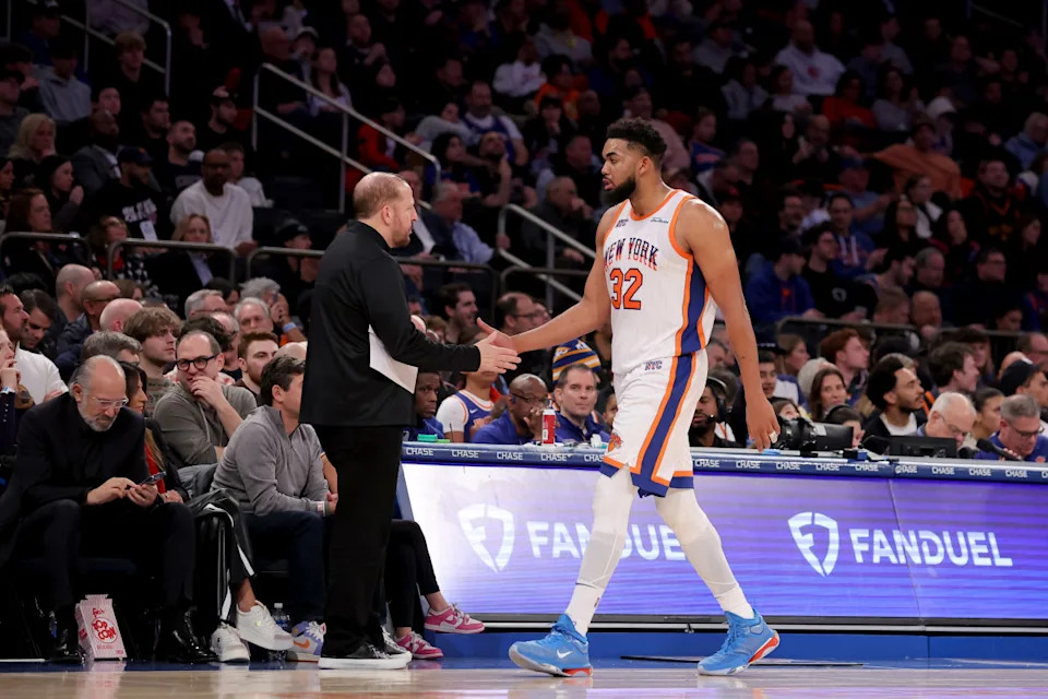 Jan 10, 2025; New York, New York, USA; New York Knicks center Karl-Anthony Towns (32) shakes hands with New York Knicks head coach Tom Thibodeau as he exits the game during the third quarter against the Oklahoma City Thunder at Madison Square Garden. © Brad Penner-Imagn Images