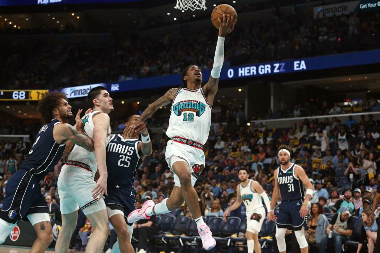Apr 18, 2025; Memphis, Tennessee, USA; Memphis Grizzlies guard Ja Morant (12) drives to the basket during the third quarter against the Dallas Mavericks at FedExForum. Mandatory Credit: Petre Thomas-Imagn Images