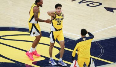 Indiana Pacers guard Ben Sheppard (26) celebrates with teammates after hitting a shot against the Oklahoma City Thunder as time expires in the third quarter during game six of the 2025 NBA Finals at Gainbridge Fieldhouse.