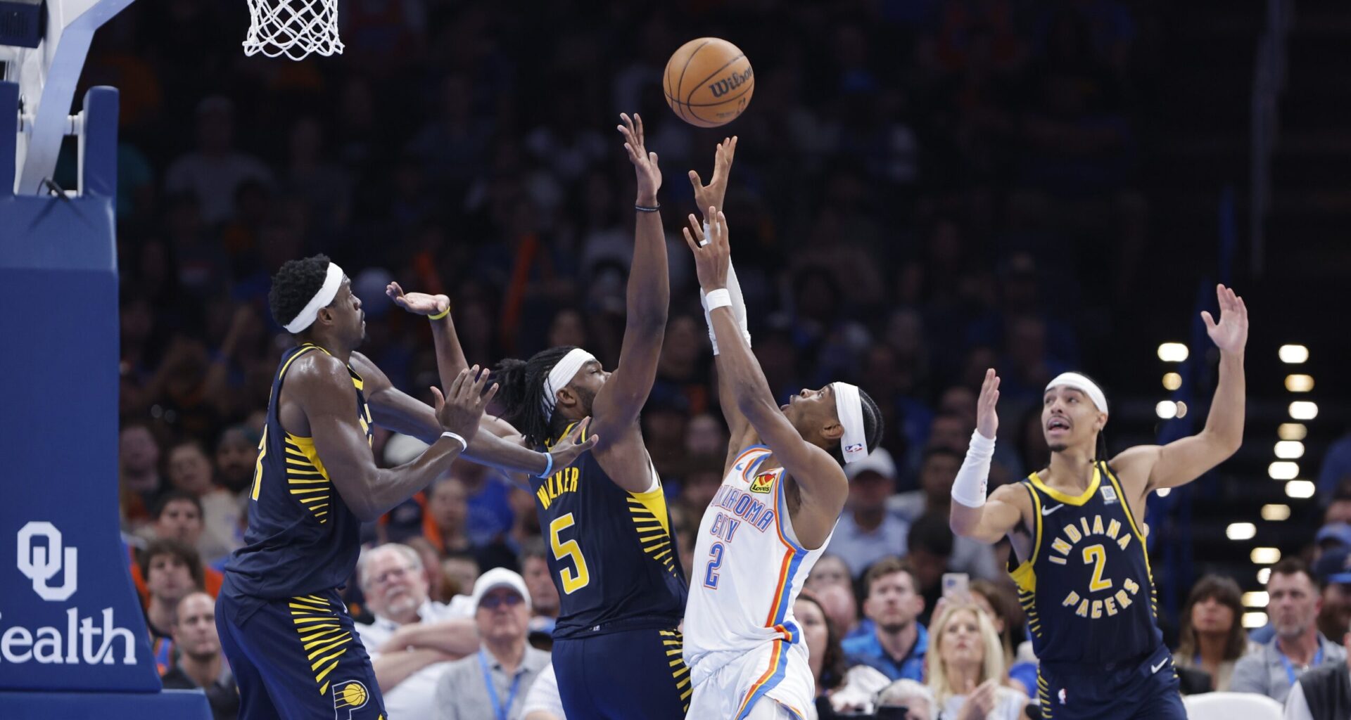 Oklahoma City Thunder guard Shai Gilgeous-Alexander (2) shoots as Indiana Pacers forward Jarace Walker (5) defends during the second half at Paycom Center.