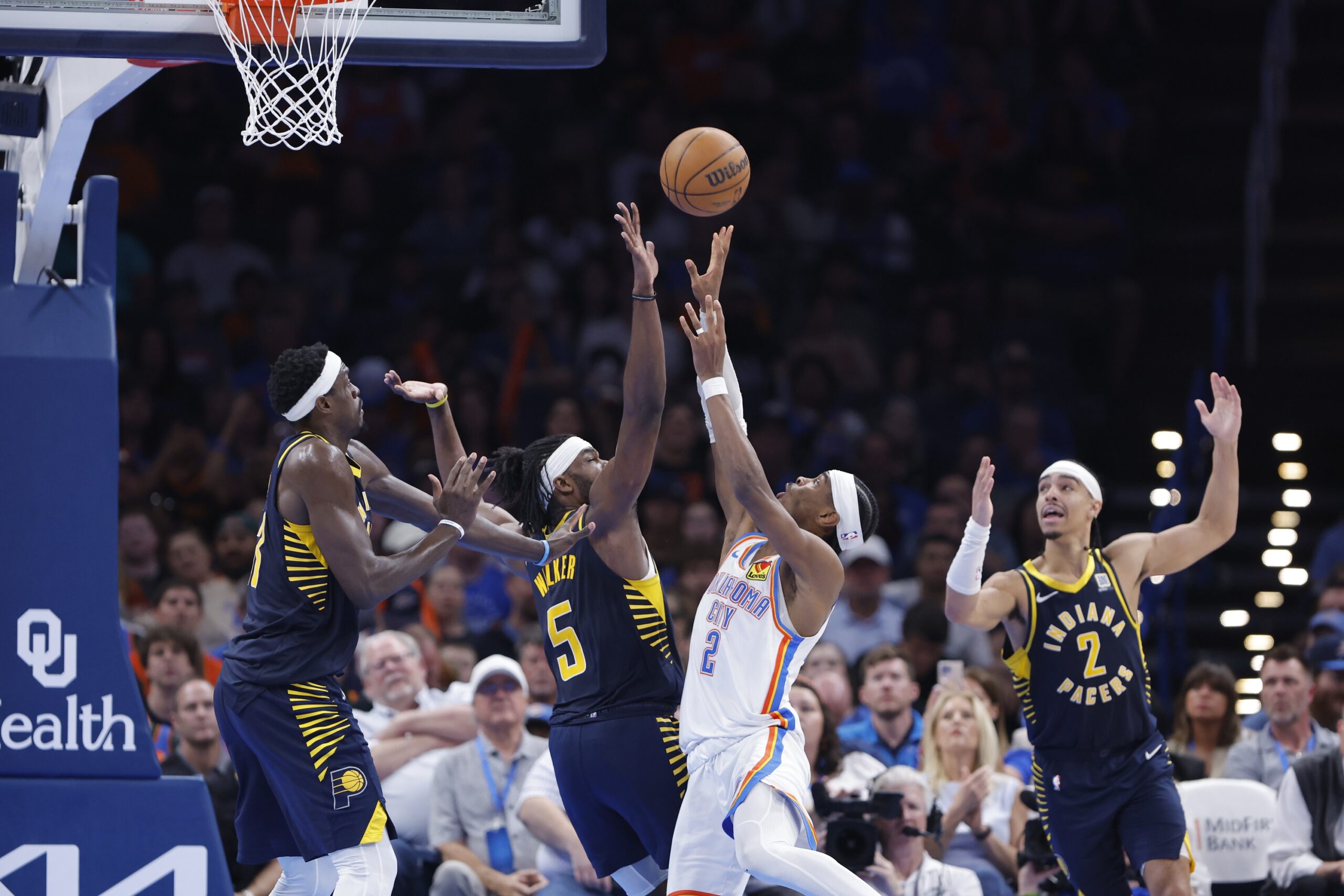 Oklahoma City Thunder guard Shai Gilgeous-Alexander (2) shoots as Indiana Pacers forward Jarace Walker (5) defends during the second half at Paycom Center.