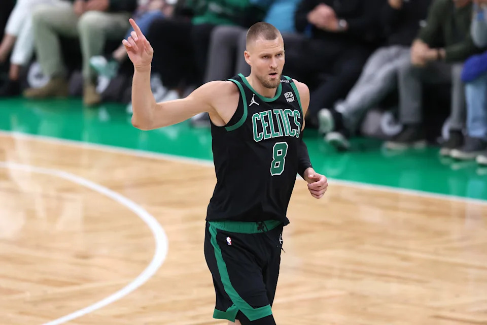 BOSTON, MASSACHUSETTS - JUNE 09: Kristaps Porzingis #8 of the Boston Celtics reacts during the first quarter against the Dallas Mavericks in Game Two of the 2024 NBA Finals at TD Garden on June 09, 2024 in Boston, Massachusetts. (Photo by Adam Glanzman/Getty Images)Adam Glanzman&sol;Getty Images