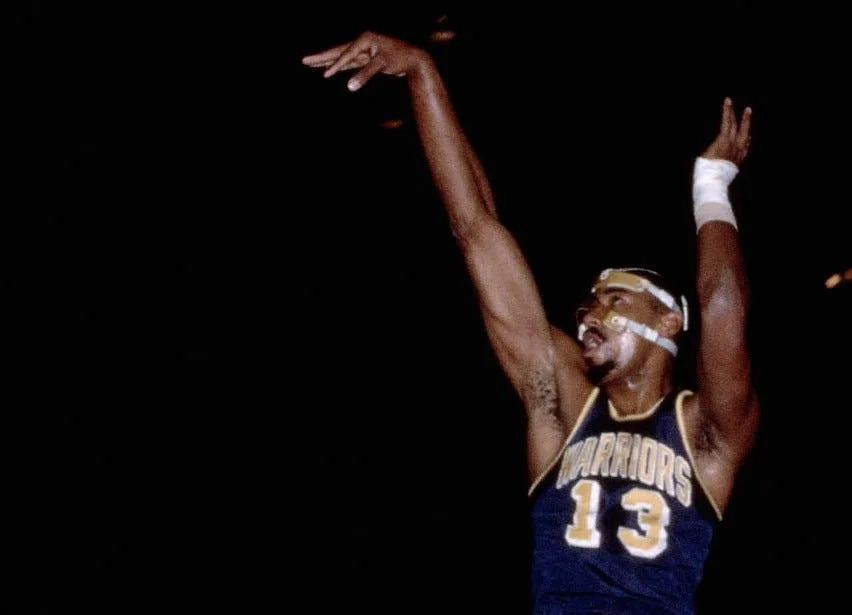 BOSTON - 1964: Wilt Chamberlain #13 of the San Francisco Warriors shoots a jumpshot against Bill Russell #6 of the Boston Celtics during an NBA game at the Boston Garden circa 1964 in Boston, Massachusetts. NOTE TO USER: User expressly acknowledges and agrees that, by downloading and/or using this Photograph, user is consenting to the terms and conditions of the Getty Images License Agreement. Mandatory Copyright Notice: Copyright 1964 NBAE (Photo by Dick Raphael/NBAE via Getty Images)