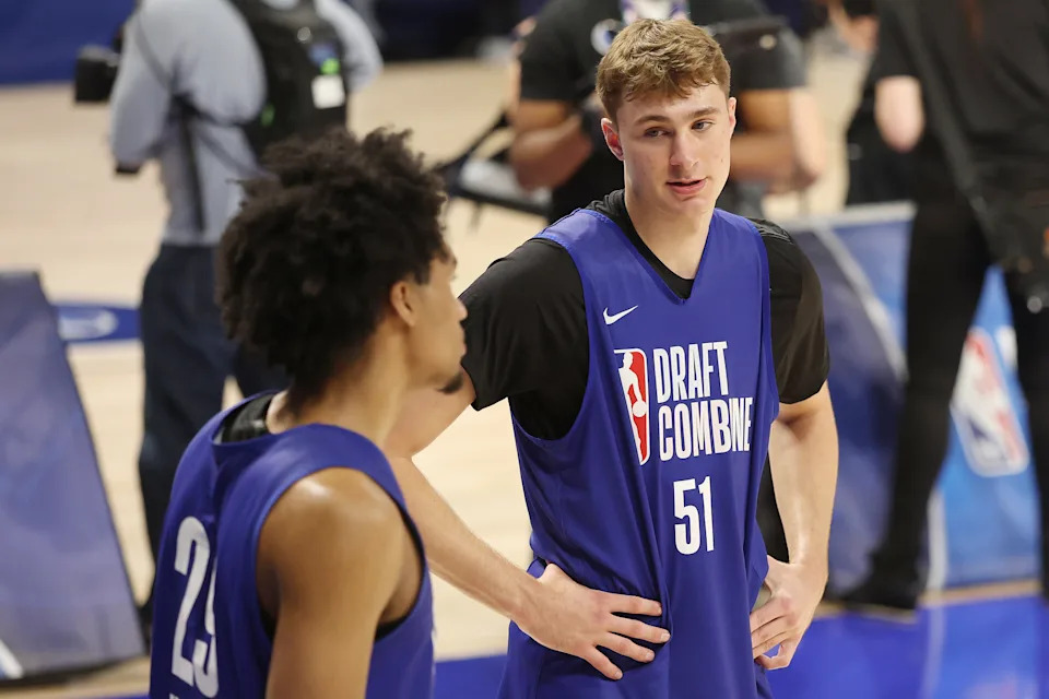 CHICAGO, ILLINOIS - MAY 13: Cooper Flagg #51 talks with Dylan Harper #29 during the 2025 NBA Draft Combine at Wintrust Arena on May 13, 2025 in Chicago, Illinois. (Photo by Michael Reaves/Getty Images)