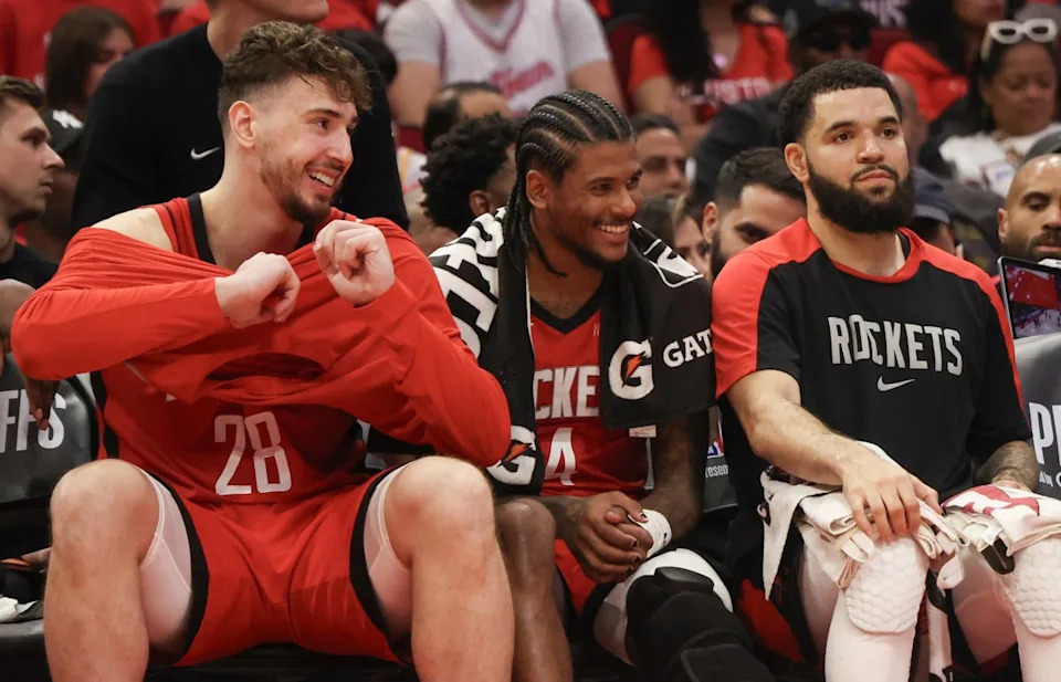 Houston Rockets center Alperen Sengun (28) guard Jalen Green (4) and guard Fred VanVleet (5).Mandatory Credit: Thomas Shea-Imagn Images