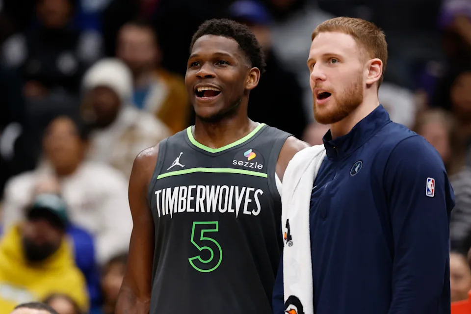 Timberwolves players Anthony Edwards and Donte DiVincenzo.Credit: Geoff Burke-Imagn Images