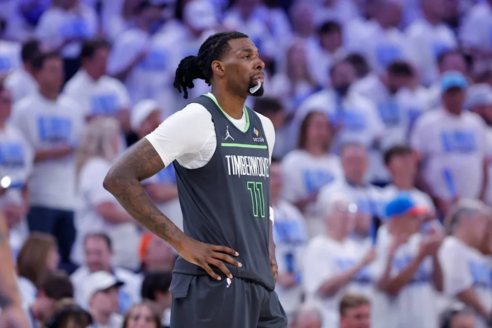 Minnesota Timberwolves center Naz Reid (11) looks down the court during a timeout against the Oklahoma City Thunder in the fourth quarter during game one of the Western Conference Finals for the 2025 NBA Playoffs at Paycom Center. 