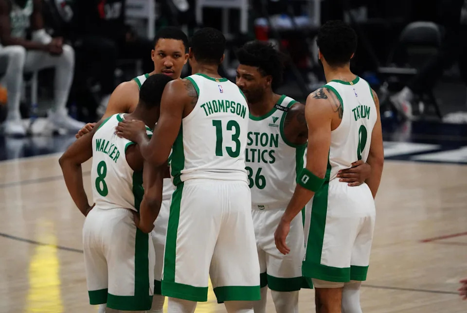 Boston Celtics forward Grant Williams (12) and guard Kemba Walker (8) and center Tristan Thompson (13) and guard Marcus Smart (36) and forward Jayson Tatum (0)© Ron Chenoy-Imagn Images