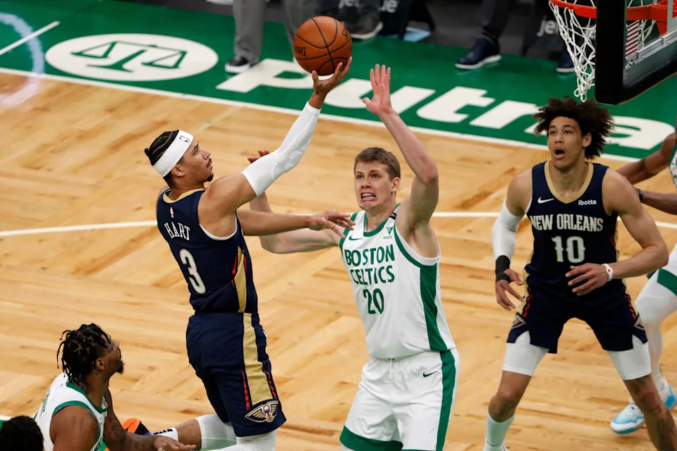 Mar 29, 2021; Boston, Massachusetts, USA; New Orleans Pelicans guard Josh Hart (3) goes to the basket past Boston Celtics forward Moritz Wagner (20) during the first quarter at TD Garden. Mandatory Credit: Winslow Townson-USA TODAY Sports