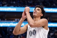 Dallas Mavericks guard Max Christie (00) reacts after fouling New Orleans Pelicans guard...