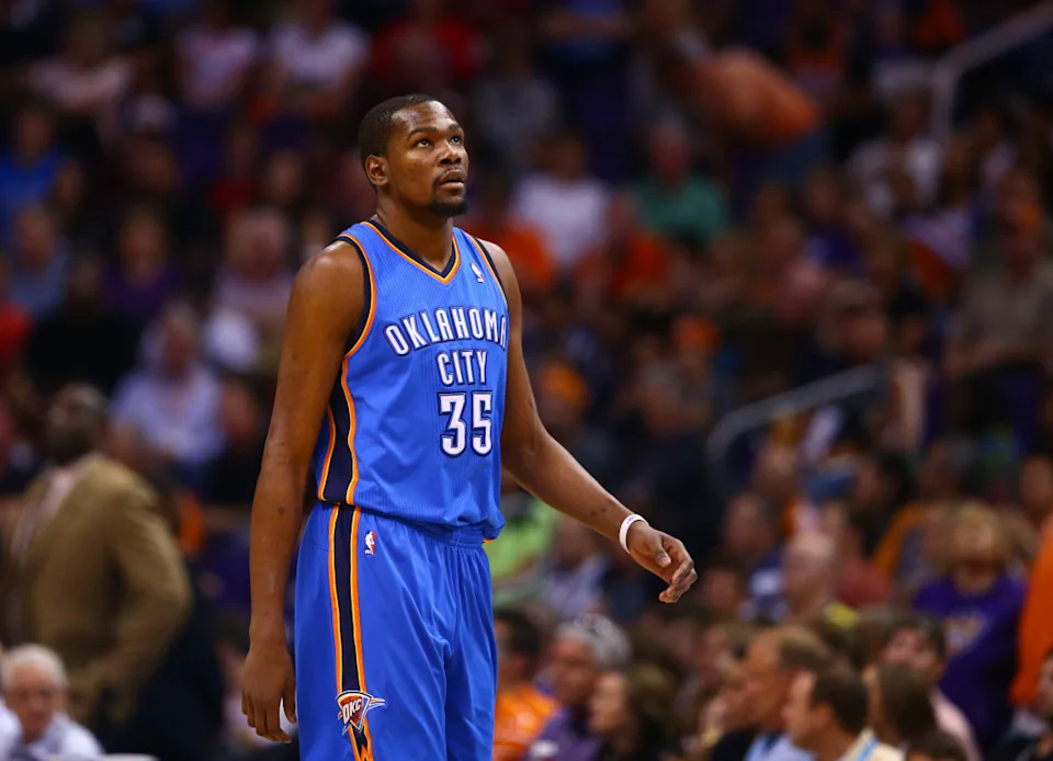 Apr 6, 2014; Phoenix, AZ, USA; Oklahoma City Thunder forward Kevin Durant (35) against the Phoenix Suns at US Airways Center. The Suns defeated the Thunder 122-115. Mandatory Credit: Mark J. Rebilas-Imagn Images Mandatory Credit: Mark J. Rebilas-Imagn Images