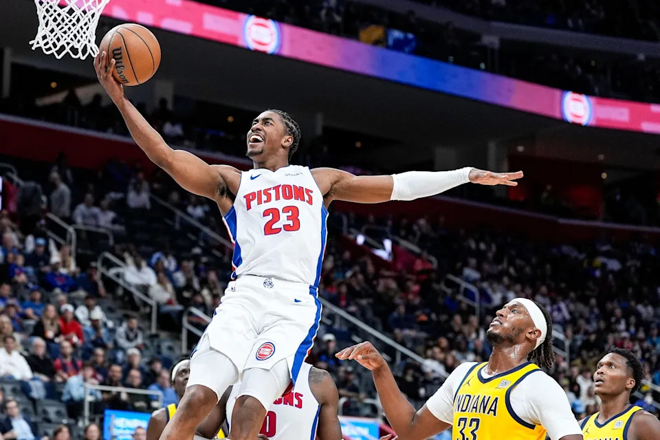 Detroit Pistons guard Jaden Ivey (23) makes a layup against Indiana Pacers during the second half of season opener at Little Caesars Arena in Detroit on Wednesday, Oct. 23, 2024.