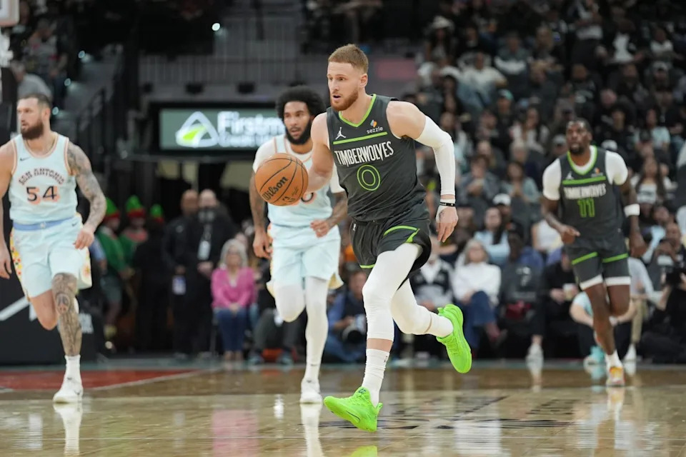 Dec 15, 2024; San Antonio, Texas, USA; Minnesota Timberwolves guard Donte DiVincenzo (0) dribbles up the court in the first half against the San Antonio Spurs at Frost Bank Center. Mandatory Credit: Daniel Dunn-Imagn ImagesCredit&colon; Daniel Dunn-Imagn Images