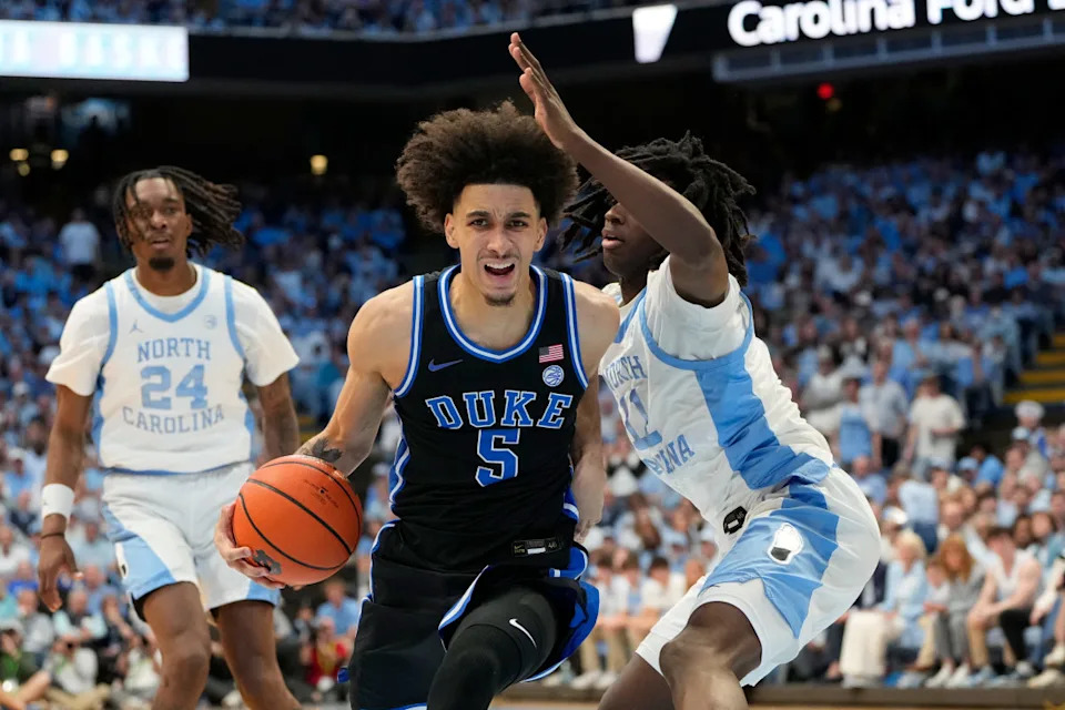 Duke Blue Devils guard Tyrese Proctor (5) with the ball as North Carolina Tar Heels guard Ian Jackson (11) defends in the first half at Dean E. Smith Center. Bob Donnan-Imagn Images