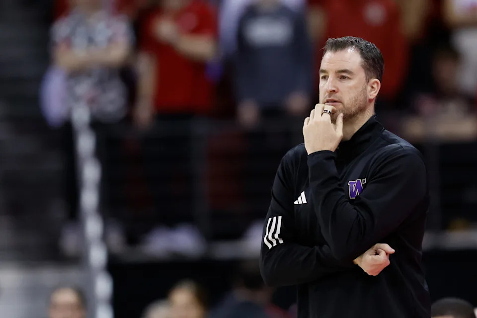 MADISON, WISCONSIN - FEBRUARY 25: Danny Sprinkle head coach of the Washington Huskies looks on during the first half of the game against the Wisconsin Badgers at Kohl Center on February 25, 2025 in Madison, Wisconsin. (Photo by John Fisher/Getty Images)