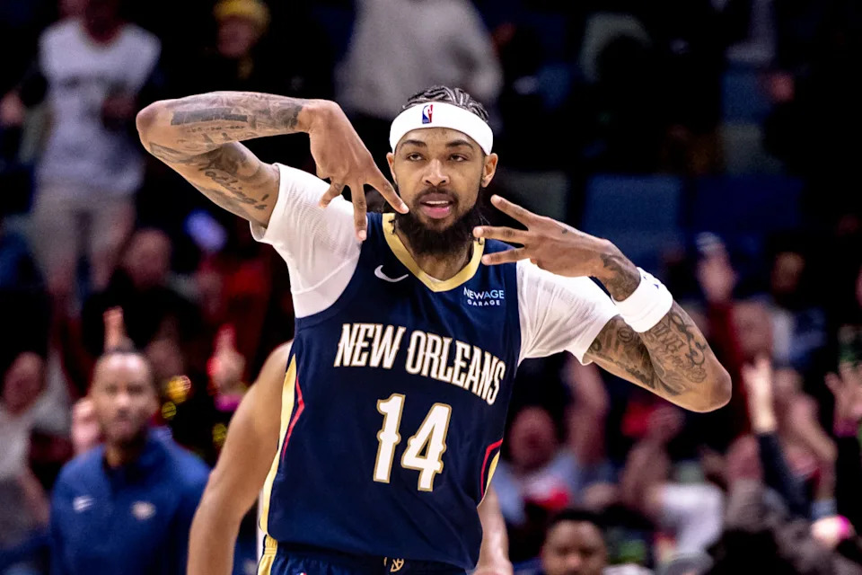New Orleans Pelicans forward Brandon Ingram reacts after making a 3-pointer against the Phoenix Suns at Smoothie King Center on Dec. 5, 2024.Stephen Lew-Imagn Images