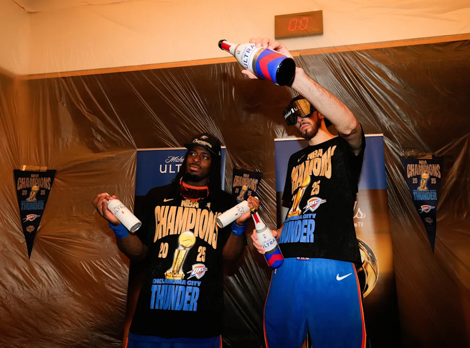 Jun 22, 2025; Oklahoma City, Oklahoma, USA; Oklahoma City Thunder guard Luguentz Dort (5) and forward Chet Holmgren (7) celebrate after winning game seven of the 2025 NBA Finals against the Indiana Pacers at Paycom Center. Mandatory Credit: Kyle Terada-Imagn Images